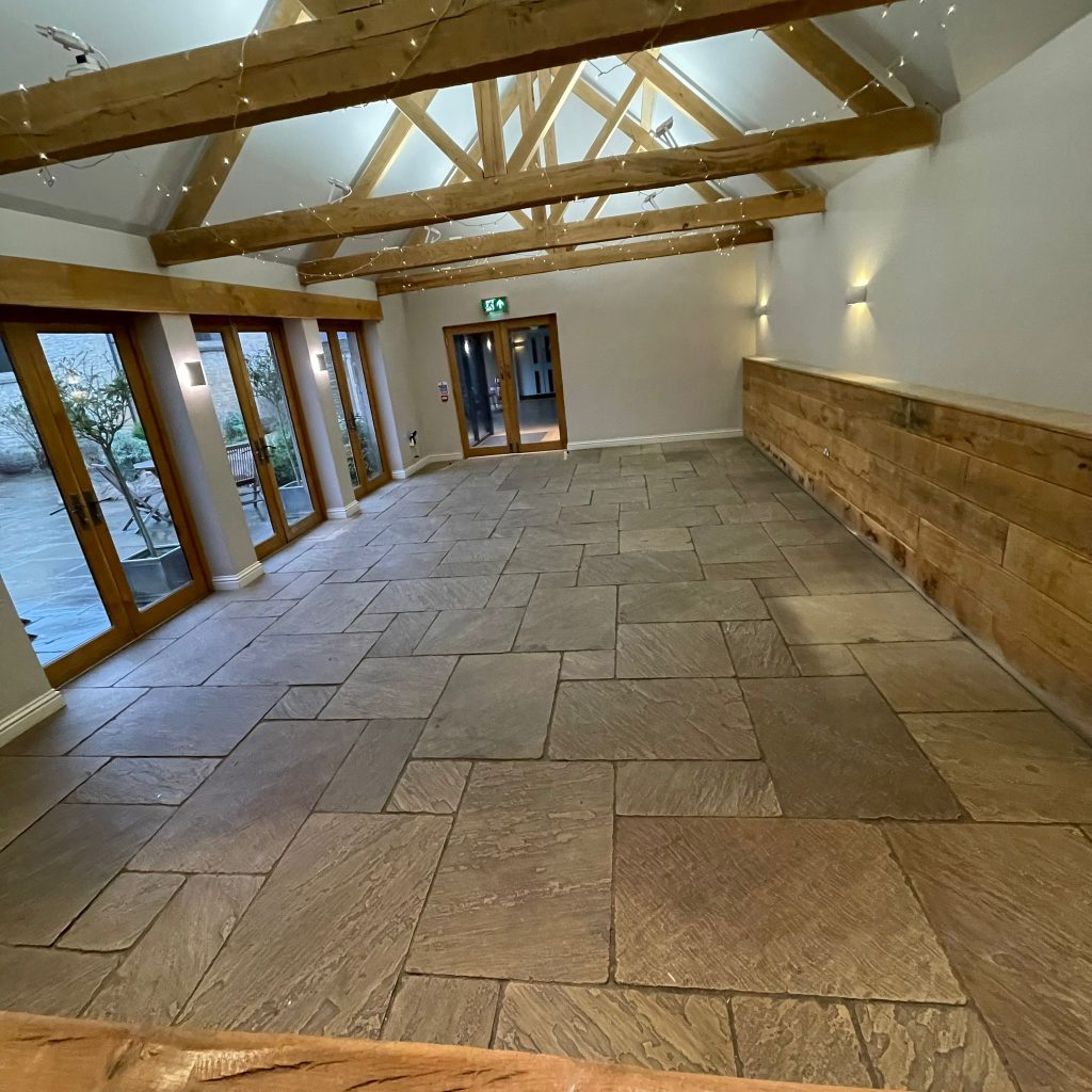 Beautiful results on flagstone flooring in Cheltenham venue 2 Hard floor cleaning of flagstones in Cheltenham