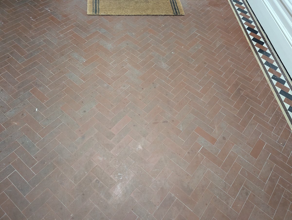 Quarry tiles and Victorian tiles prior to cleaning